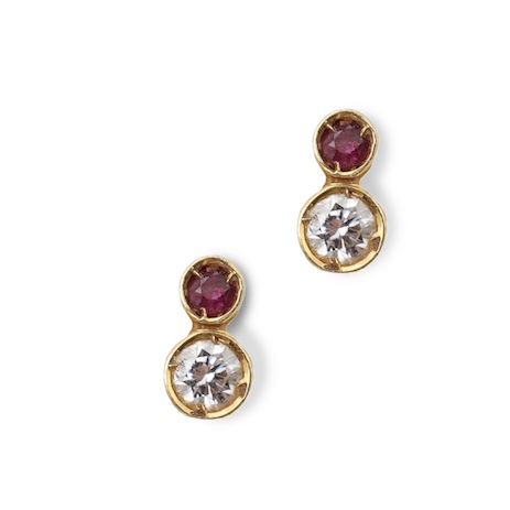 A pair of ruby and diamond stud earrings, set with brilliant-cut diamonds totalling approximately 0.15 carats, surmounted by circular-cut rubies, in gold collet settings, length 0.6cm each, post fittings